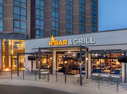 Hilton Arlington Hotel R Bar & Grill Exterior at Dusk