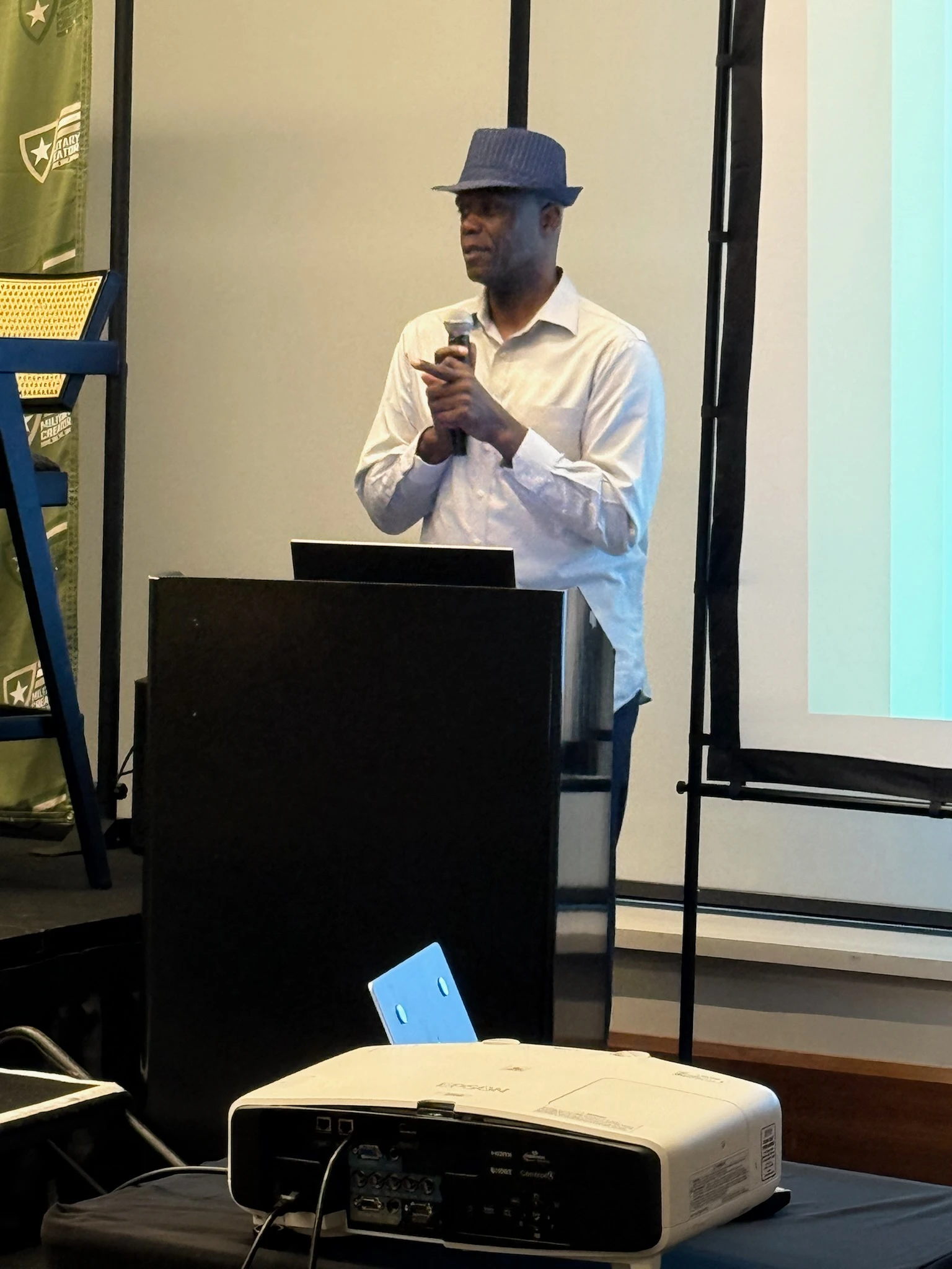 A speaker presenting at Military Creator Con